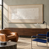 Offset White Texture and Corner Grids Wall Art shown above a dark cabinet in a seating area.