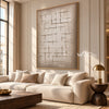 Open Crosshatch Textured Canvas shown above a sofa.