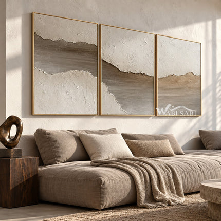 Pale Earth Passage 3-Piece Set shown above a sofa.