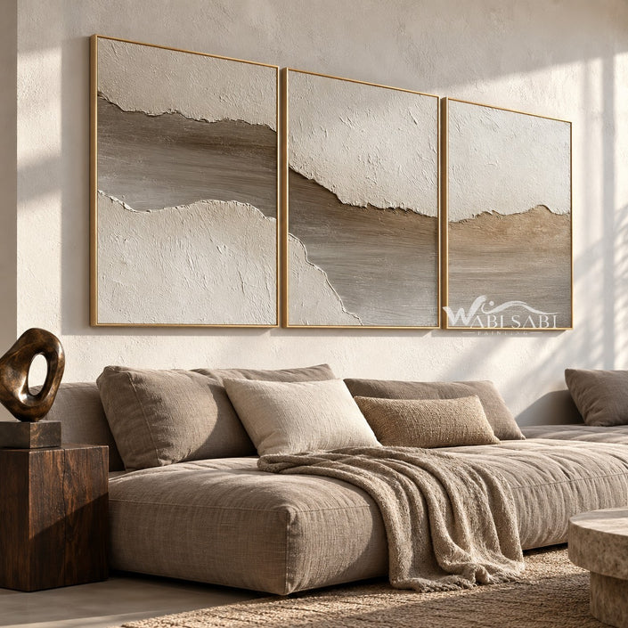 Pale Earth Passage 3-Piece Set shown above a sofa.
