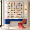 Pastel and Bright Dot Grid Painting shown above a console.
