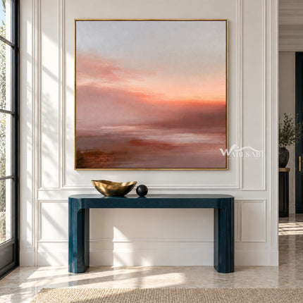 Peach Sunset over Quiet Water Wall Art shown above a green console.