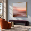 Peach Sunset over Quiet Water Wall Art shown above a burgundy bench.