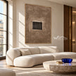 Quiet Aperture Taupe Abstract Art shown above a sofa.