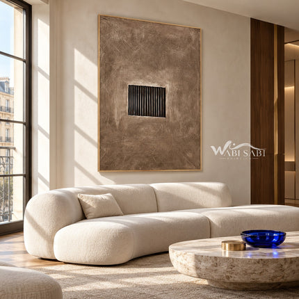 Quiet Aperture Taupe Abstract Art shown above a sofa.