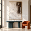 Raised Line Seated Figure Abstract Painting shown above a console.