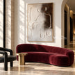 Raised Line Seated Figure Abstract Painting shown in a living room with a sofa.
