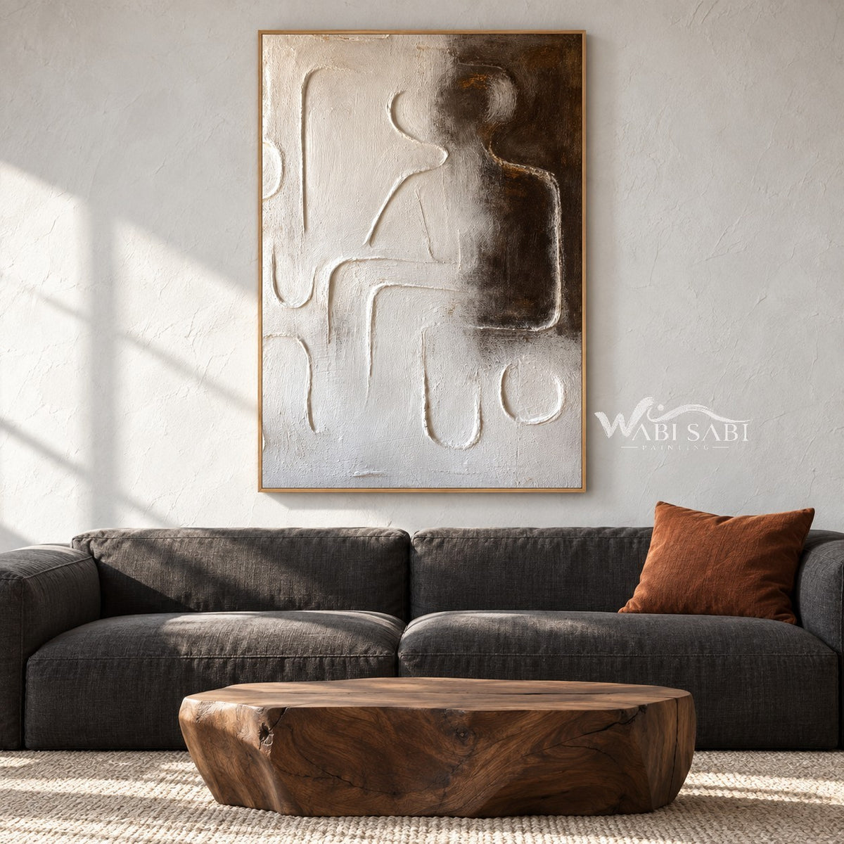 Raised Line Seated Figure Abstract Painting shown in a living room with a sofa.