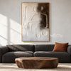 Raised Line Seated Figure Abstract Painting shown in a living room with a sofa.