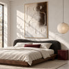 Raised Line Seated Figure Abstract Painting shown in a bedroom.