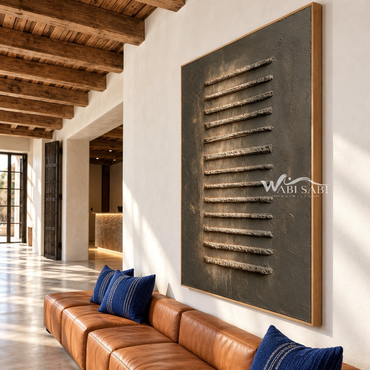 Raised Steps on Charcoal Canvas shown above a sofa.