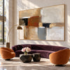 Rust and Gray Color Block Canvas Painting shown in a living room with a sofa.