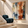 Rust and Navy Water Reflection Abstract Wall Art shown beside a staircase.