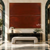 Rust Red Field with a Fine Seam Wall Art shown above a console and pale bench.