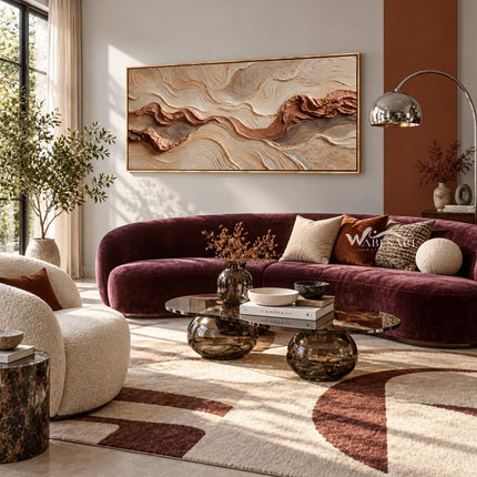 Rust Seam and Cream Contour Wall Art shown above a burgundy sofa.
