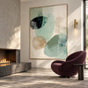Sage Oval Shapes and Fine Lines Painting shown near a fireplace.