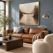 Sepia Mountain Lake Landscape Painting shown in a living room with a sofa.