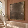 Smoky Brown Weathered Field Wall Art shown beside a staircase.