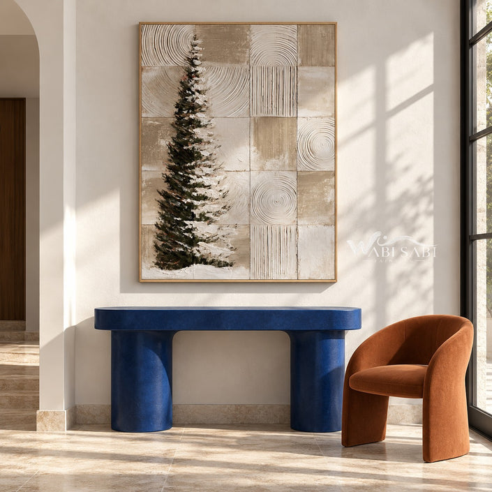 Snowy Evergreen and Neutral Grid Painting shown above a console.