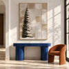 Snowy Evergreen and Neutral Grid Painting shown above a console.