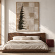 Snowy Evergreen and Neutral Grid Painting shown in a bedroom.
