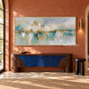 Soft Aqua Horizon with Gold Accents Wall Art shown above a blue-fronted console on a terracotta wall.