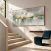 Soft Aqua Horizon with Gold Accents Wall Art shown beside a staircase.