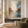 Soft Cream and Sage Cloud Abstract Painting shown above a bench.