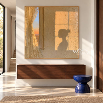 Sunset Window and Profile Shadow Painting shown above a console.