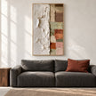 Tall Ivory and Earth Tone Block Painting shown in a living room with a sofa.
