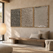Taupe Texture Study Triptych Wall Art shown above a long pale bench.