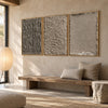 Taupe Texture Study Triptych Wall Art shown above a long pale bench.