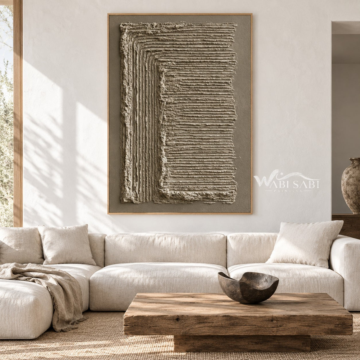 Turning Lines in Taupe Canvas shown above a sofa.