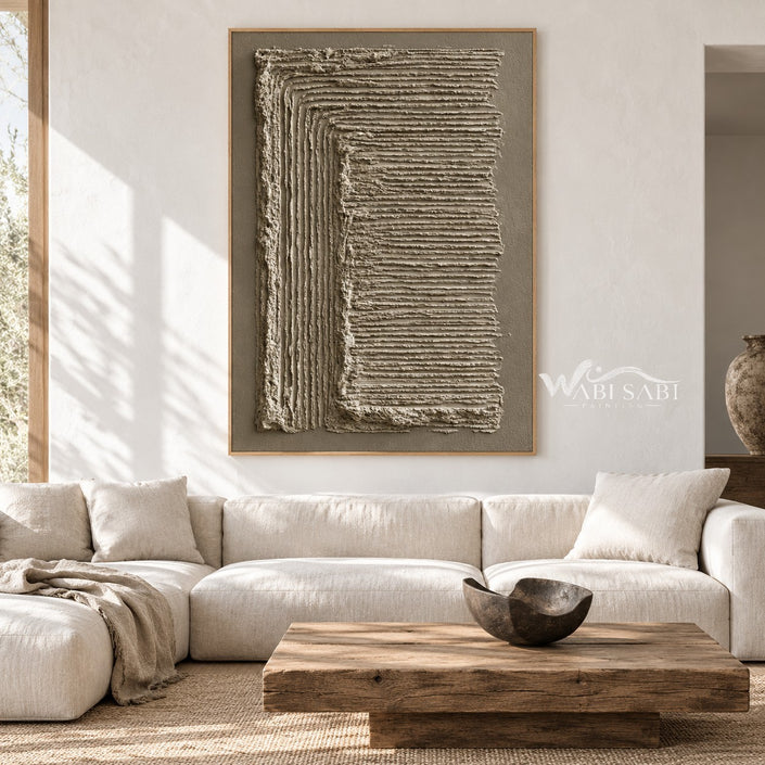 Turning Lines in Taupe Canvas shown above a sofa.