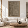 Turning Lines in Taupe Canvas shown above a sofa.