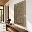 Turning Lines in Taupe Canvas shown above a bench.