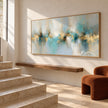 Turquoise Reflections and Gold Horizon Wall Art shown beside a staircase.