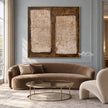 Two Cream Blocks on Brown Abstract Wall Art shown above a curved pale sofa.