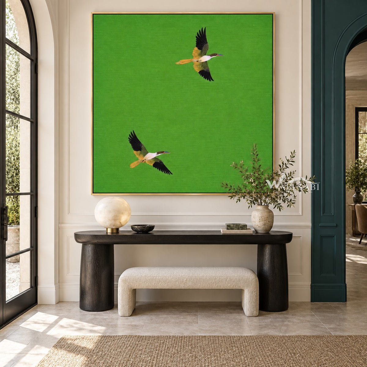 Two Flying Birds on Bright Green Wall Art shown above a dark console.