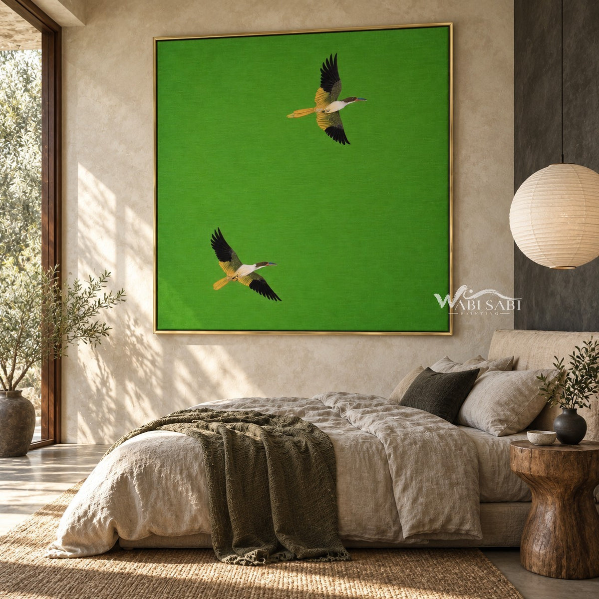 Two Flying Birds on Bright Green Wall Art shown above a bed.
