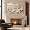 Unfolding Cream Blossom Painting shown near a fireplace.