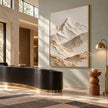 Vertical Ivory Mountain Valley Wall Art shown above a curved dark counter.