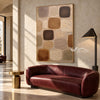 Warm Neutral Rounded Blocks Painting shown in a living room with a sofa.
