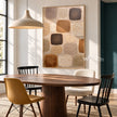 Warm Neutral Rounded Blocks Painting shown in a dining area.