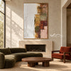 White and Muted Patchwork Abstract Painting shown above a fireplace.