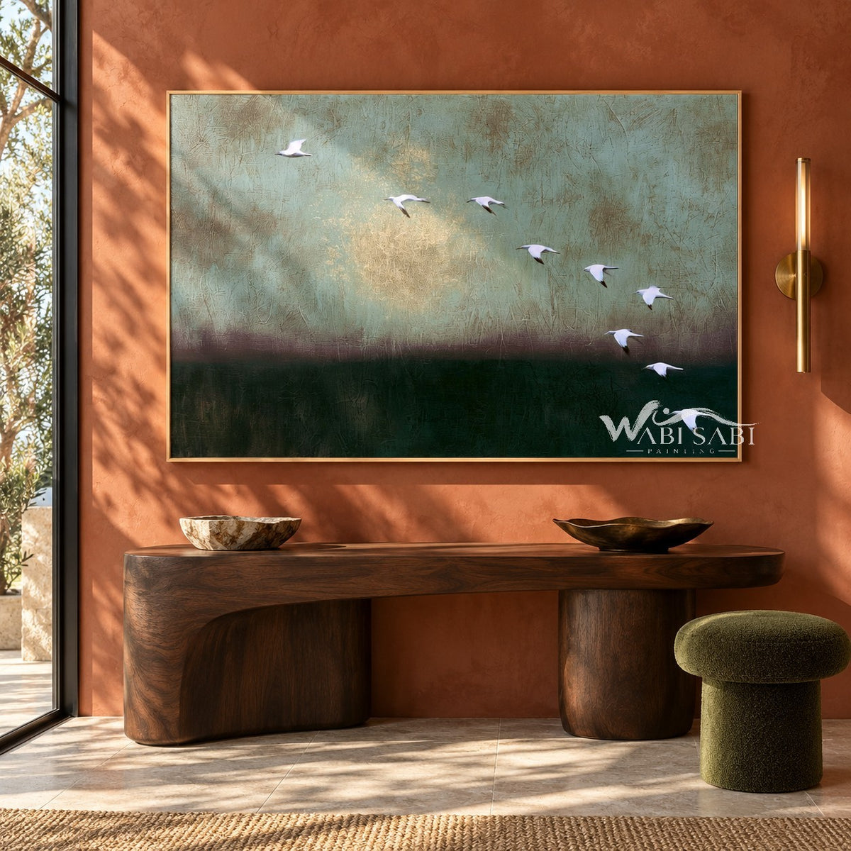 White Birds over Deep Green Wall Art shown above a wood console on a terracotta wall.