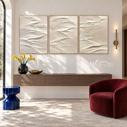 White Folded Ridges Triptych Wall Art shown above a console.