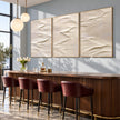 White Folded Ridges Triptych Wall Art shown in a bar area.