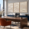 White Folded Ridges Triptych Wall Art shown in a workspace.