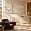 White Folded Ridges Triptych Wall Art shown in a seating area.